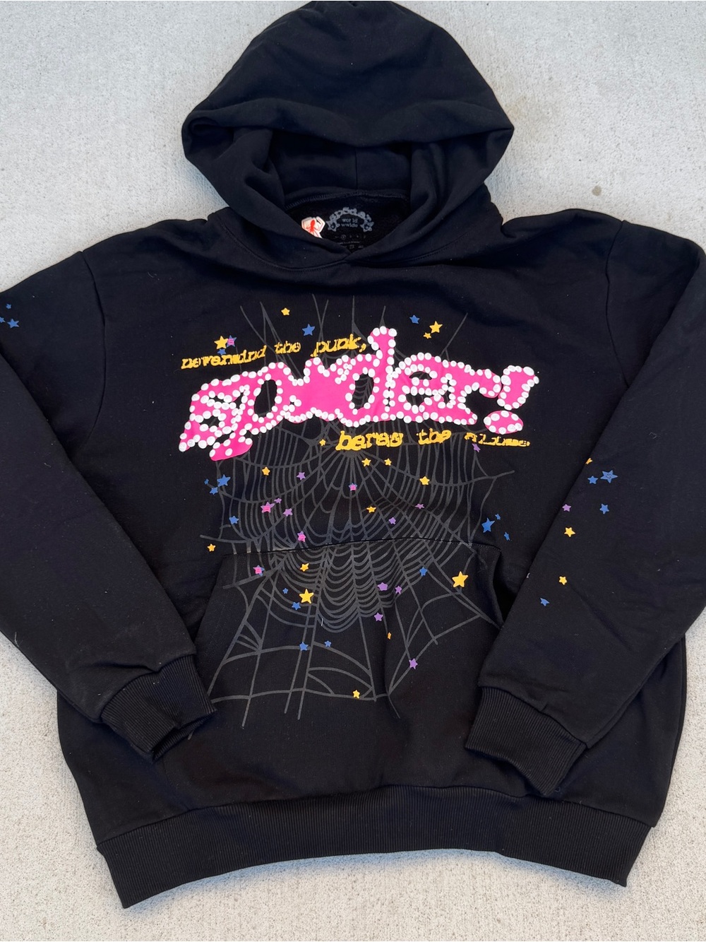 Black Graphic Crewneck Sweater with Pink Script and Star Accents